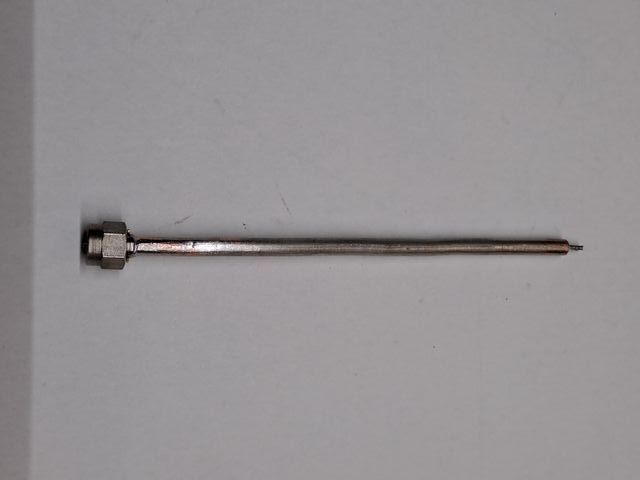 Semi-rigid coax with SMA connector.